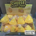 Soft yellow cheese-shaped squeeze toy for stress relief and sensory play in display box - Triangle Cheese Squishy (7cm) / Yellow