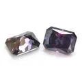 Detailed macro view of two radiant cut imperial purple moissanite loose gemstones - 5*7mm 1ct + GRA Girdle Code / Imperial Purple