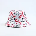 Close-up of the romantic LOVE print on this stylish white bucket hat for women. - Love Heart Print