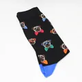 Detailed view of black crew socks featuring a colorful cartoon pug pattern. - One Size / Black Glasses Cartoon Dog (A353)