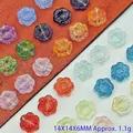 Macro view of colorful 14mm sunflower glass beads highlighting textures and parameter text. - Multicolor