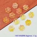 Detailed macro view of 14mm sunflower-shaped gradient glass beads for DIY jewelry - Sunflower / 14mm / Light Orange