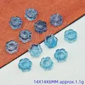 Detailed view of 14mm blue sunflower glass beads for DIY jewelry crafting projects - Peacock Blue