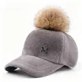 Side view of grey fuzzy baseball cap featuring large tan fur pom-pom and silver M logo. - Adult Size (58CM Adjustable) / Gray Hat with Camel Pom Pom