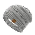 Detailed view of gray knitted beanie featuring warm fleece lining and a star patch detail - Gray