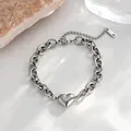 Elegante zilveren roestvrijstalen armband met hartje en een grove schakelketting design - Armband / Staalkleur