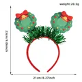 Festive Christmas wreath headband with red bows and green tinsel decorations, 21x23cm - Wreath Tinsel Headbands