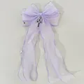 Pince à cheveux nœud en résille lavande avec pendentifs croix et longs rubans élégants - Violet