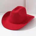 Close-up of a vibrant red felt Western cowboy hat with wide curved brim - M (56-58cm) / Red