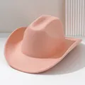 Detailed view of a solid pink felt western cowboy hat with minimalist wide brim design - M (56-58cm) / Lotus Pink