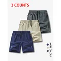 Detailansicht von drei schnelltrocknenden Herren-Sportshorts in Grau, Khaki und Marineblau - S / Unterteile / 3er-Pack / Navy + Khaki + Dunkelgrau