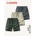 Set mit drei schnelltrocknenden Herren-Sportshorts in Olivgrün, Khaki und Anthrazitgrau - S / Unterteile / 3er-Pack / Armeegrün + Khaki + Dunkelgrau