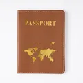 Premium-Reisepasshülle aus braunem PVC mit goldgeprägter Weltkarte und Flugzeug - Reisepasshülle / Passport Cover Brown