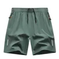 Herren Sportshorts aus Eisseide in Olivgrün, schnelltrocknend mit Reflektorstreifen - S / Unterteile / Mintgrün