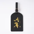Black PVC luggage tag with a golden world map and airplane flight path design - Luggage Tag Black