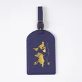 Professional dark blue PVC luggage tag featuring a gold embossed world map and airplane design - Blue Luggage Tags