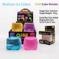 Macro view of translucent cube squeeze toys in multiple colors with packaging box - Solid Transparent Cube (Boxed) / 5cm