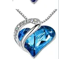 Elegant silver-toned necklace with a brilliant blue heart-shaped zircon pendant - Peacock Blue