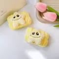 Simpatici polsini in peluche gialli con faccina a stella per il lavaggio del viso quotidiano. - 40 - Nettuno giallo (Polsino singolo)
