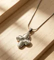 Elegant silver four-leaf clover pendant necklace with polished finish and center crystal - Four-Leaf Clover Style (MW-20B) / Silver