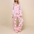 Conjunto de pijama de satén rosa con estampado de Papá Noel y ribete de plumas - S / Top Y Pantalón / Rosa