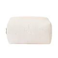 Elegant cream quilted makeup bag with shell pattern stitching and zipper closure - Octagonal Bag Style / Off White