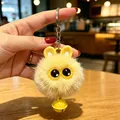Simpatico portachiavi in peluche coniglietto giallo con occhi grandi e piccolo campanello - Coniglio giallo con campanello