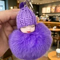 Simpatico cappello lavorato a maglia viola bambola che dorme con portachiavi pompon - Bambola Viola