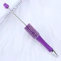 Elegant purple DIY beaded ballpoint pen featuring a sparkling rhinestone barrel detail - 1.0mm Bullet Tip / Fluorescent Purple