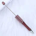 Glittery brown DIY beaded ballpoint pen with sparkling pink rhinestone accents - 1.0mm Bullet Tip / Pearlescent Coffee