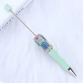 Mint green DIY beadable ballpoint pen featuring colorful rhinestone barrel decoration - 1.0mm Bullet Tip / Pine Green