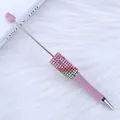 DIY pink beaded ballpoint pen featuring a colorful rainbow rhinestone gradient sleeve - 1.0mm Bullet Tip / Lilac