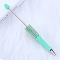 Mint green DIY beadable ballpoint pen with a sparkling rhinestone grip for crafting. - 1.0mm Bullet Tip / Light Green B