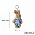 Adorable plush rabbit keychain wearing blue floral overalls, cute bag charm variant - Blue Floral Linen Rabbit Male Style / Approx. 11cm