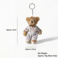 Adorable cartoon linen bear keychain plush toy pendant wearing miniature white overalls - Floral Bow Male Bear Style / Approx. 11cm