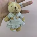 Cute plush bear keychain accessory wearing a grey checkered dress with wooden buttons - Light Brown Bow Female Bear Style / Approx. 11cm