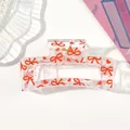 Close-up of transparent hair claw clip with red bow and heart patterns. - Style F Transparent / 8.5cm Size