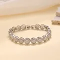 Vue détaillée du bracelet hip hop argenté pour hommes serti de diamants ronds brillants - Épissage Rond (790-1) / Argent