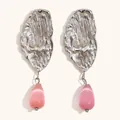 Elegant stainless steel ocean-themed drop earrings with textured pink teardrop stone - Steel