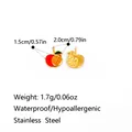 Golden stainless steel apple fruit charm pendant with size and weight specifications - Enamel Apple Orange Style (PJ0818)