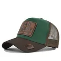 Two-tone green and brown mesh trucker baseball hat featuring a 'Daddy' leather patch - Adjustable / Coffee & Green