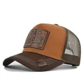 Two-tone brown trucker cap featuring leather DAD DADDY slogan patch and mesh back design - Adjustable / Coffee & Brown