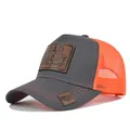 Grey and orange mesh trucker cap featuring DAD in the streets DADDY in the sheets leather patch - Adjustable / Dark Gray & Orange Mesh
