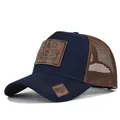 Navy blue trucker hat featuring a brown leather DAD patch and breathable mesh back. - Adjustable / Navy & Coffee Mesh