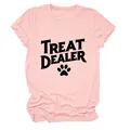 Casual light pink women's round neck T-shirt featuring a black TREAT DEALER paw print logo - S / Tops / Pink (Black Text)