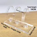 Transparent acrylic watch display stand with three slots on a light wood surface - Thickened 3-Slot