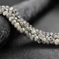 Detail of faceted 4x6mm dalmatian jasper rondelle beads for DIY handmade jewelry making - 4x6mm Faceted (Approx 82 Pieces) / Dalmatian Jasper Color