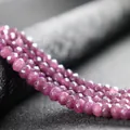 Macro view of faceted 4x6mm pink purple abacus wheel beads for DIY jewelry making - 4x6mm Faceted (Approx 82 Pieces) / Garnet Red