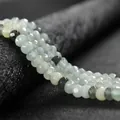 Macro view of faceted 4x6mm abacus beads in light green and grey for DIY jewelry making - 4x6mm Faceted (Approx 82 Pieces) / Flower Amazonite