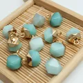 Detail showing faceted light blue semi-precious stone pendants on natural bamboo tray - 8x13mm / Amazonite Style (2)